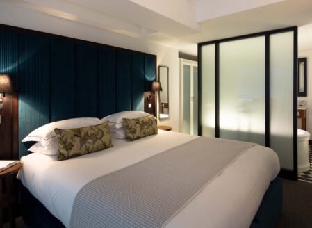 A deluxe one-bedroom apartment bedroom