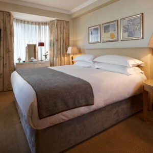 A luxury two-bedroom apartment bedroom