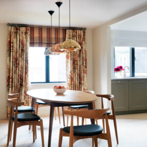 The open plan kitchen diner in a two-bedroom penthouse at 15 Cheval Place