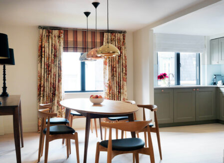 The open plan kitchen diner in a two-bedroom penthouse at 15 Cheval Place