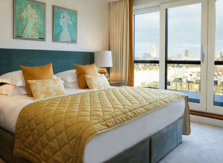 The second bedroom in a three-bedroom apartment.