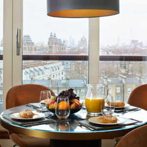 The open plan living area seats four at the dining table