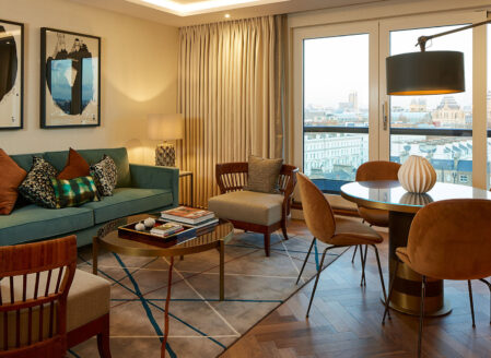 The open plan living and dining area in a luxury two-bedroom apartment