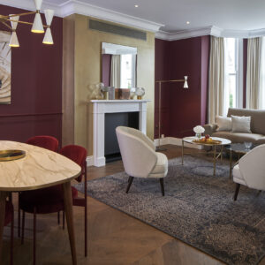 The living dining area in a Royal Red apartment