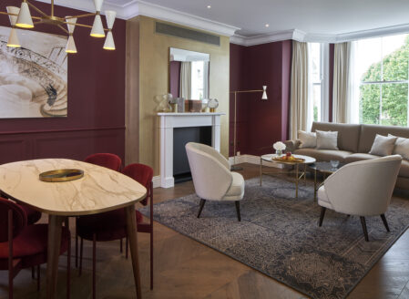 The living dining area in a Royal Red apartment