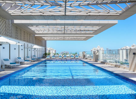 The rooftop pool with views over The Palm Jumeirah