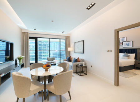 The open plan living and dining area gives direct access to the private balcony