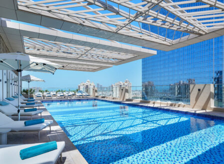 Panoramic views of the Palm Jumeirah from the roof top pool at Cheval Maison - The Palm Dubai